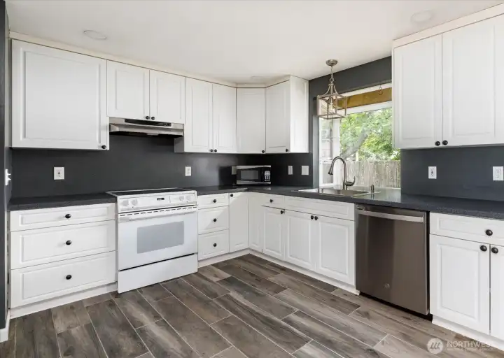 Beautifully updated kitchen showcasing modern finishes and a functional layout.