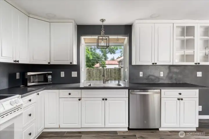 Kitchen offers plenty of storage space.
