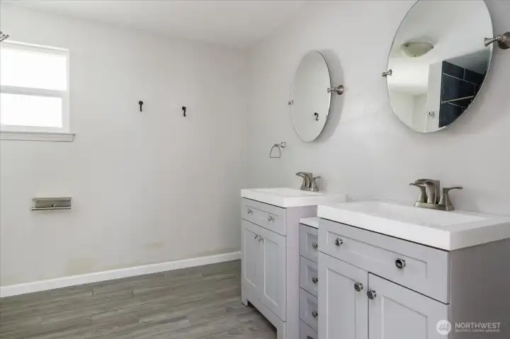 Tastefully updated bathroom featuring refreshed finishes and a clean, modern feel.