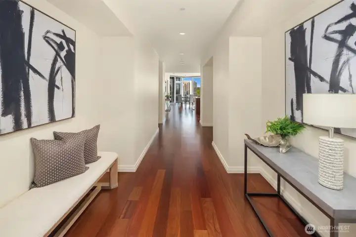 A beautiful gallery entry welcomes you with rich Brazilian cherry engineered hardwood floors. A beautiful gallery entry welcomes you with rich Brazilian cherry engineered hardwood floors.