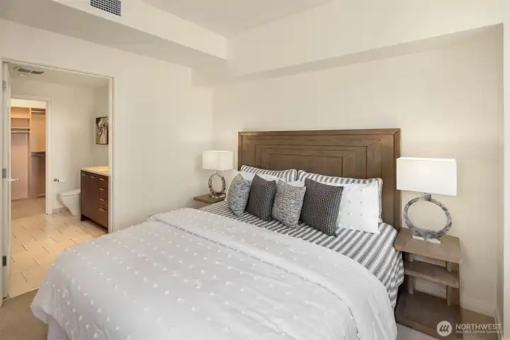 The peaceful primary suite connects seamlessly to the attached bath and walk-in closet — a private retreat to unwind. The peaceful primary suite connects seamlessly to the attached bath and walk-in closet — a private retreat to unwind.