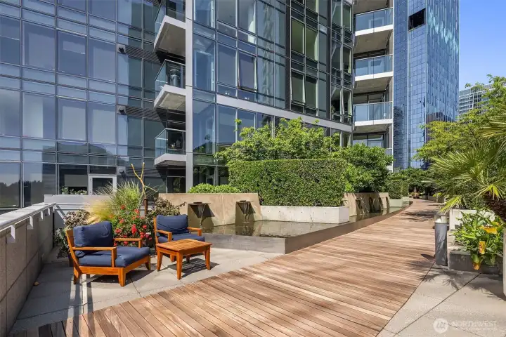 Wander through a park-like setting without ever leaving the community, complete with a wood boardwalk, a tranquil water feature, lush landscaping, and a dedicated pet relief area. Wander through a park-like setting without ever leaving the community, complete with a wood boardwalk, a tranquil water feature, lush landscaping, and a dedicated pet relief area.