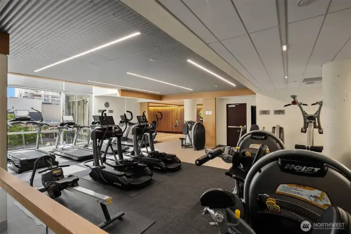 The nicely appointed cardio room includes a nook for yoga and is located just across the hall from the weight room. The nicely appointed cardio room includes a nook for yoga and is located just across the hall from the weight room.