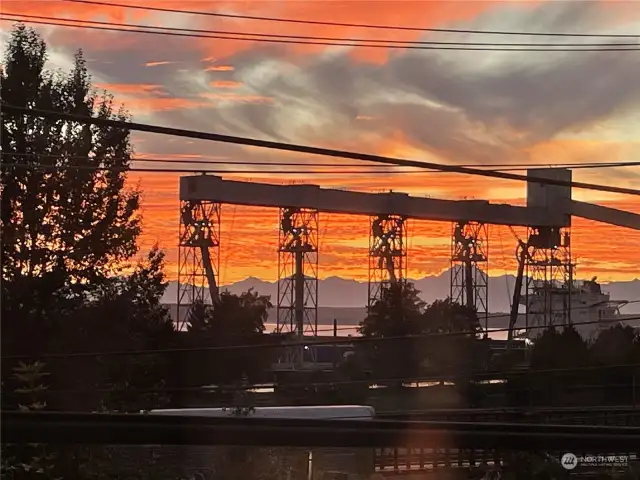 Sunset, Olympic Mountains and the grain terminal from the master Bed