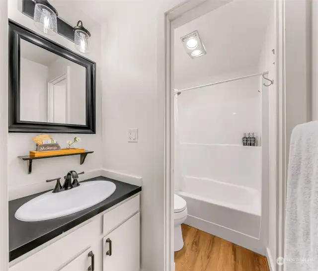 Full Bathroom with separate sink area - white and bright!