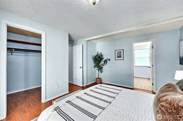 Primary bedroom with walk-in closet and spacious en-suite.
