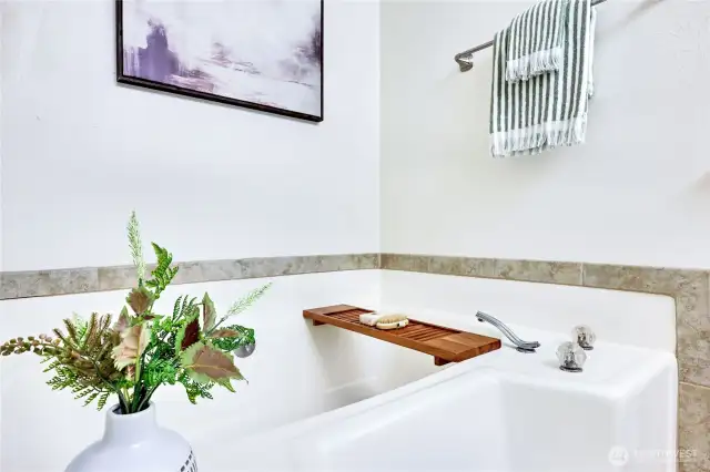 Soaking tub in primary bathroom, perfect for relaxing after a long day!
