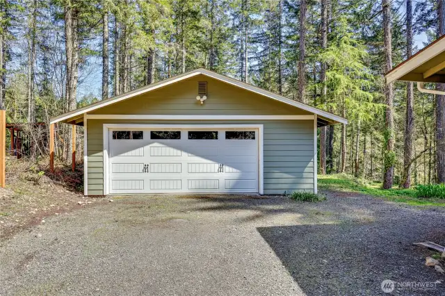 Detached garage with plenty of room for storage.
