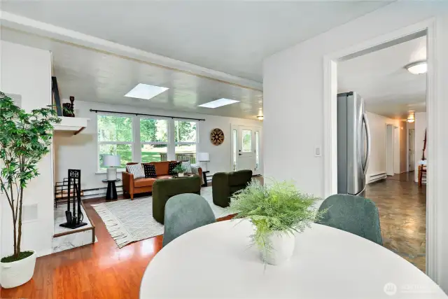 View from dining room, looking towards living room and kitchen.