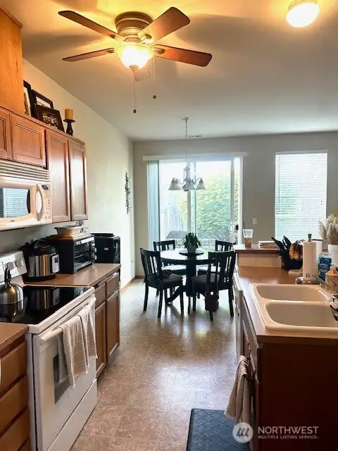 Kitchen with bar and dining space