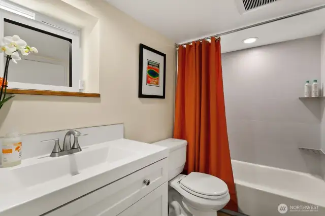 Downstairs remodeled full bathroom.