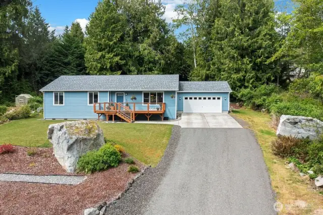 This picture perfect single level home with views and a quiet setting awaits in the well known Beach Club community. Relaxing and easy living.  Enjoy an abundance of walking trails.  Beach Club amenities. Port Ludlow is where you'll find the best of destinations!