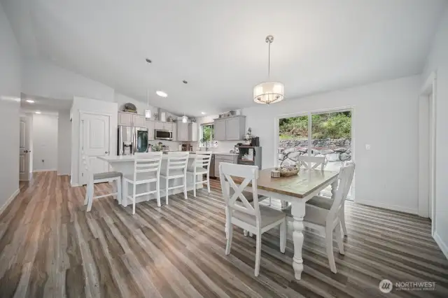 Dining eating area is open to living room and kitchen.