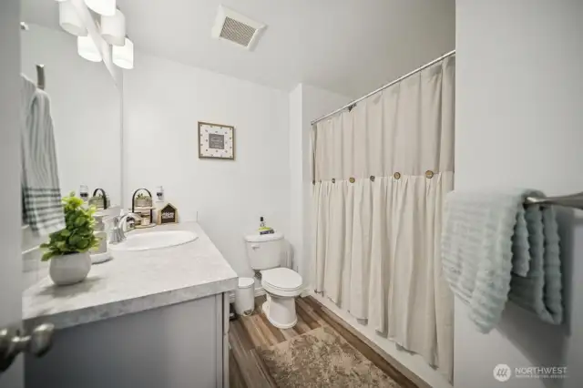 2nd bathroom with shower and tub.