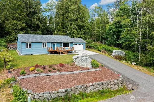 If desired, the front yard  is nice an sunny, enjoy as is or set up for gardening.