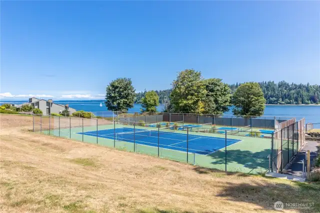 Beach Club with pickle ball courts. Indoor and outdoor pools. Private beach area.