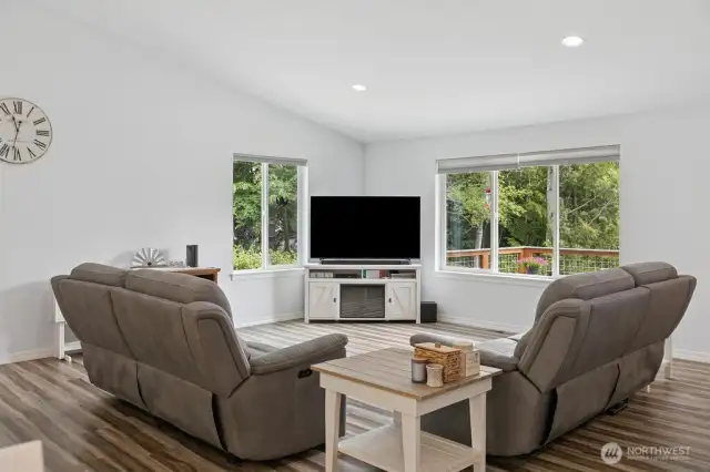 High ceilings and front windows bring in an abundance of sunlight.