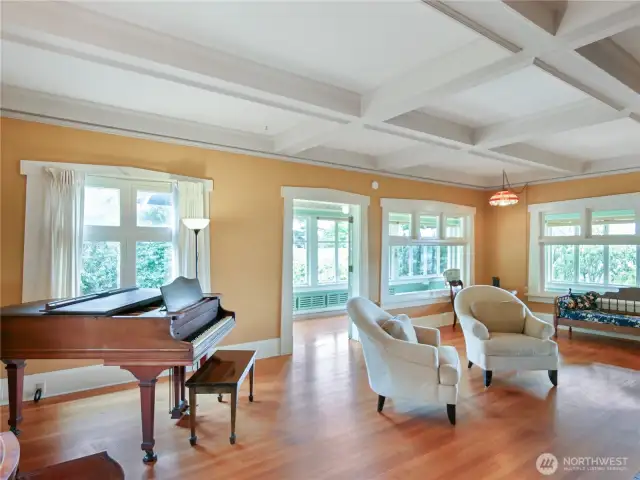 There are windows everywhere with stately garden and bay views.