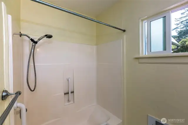 Full bath across from ground floor bedroom suite.