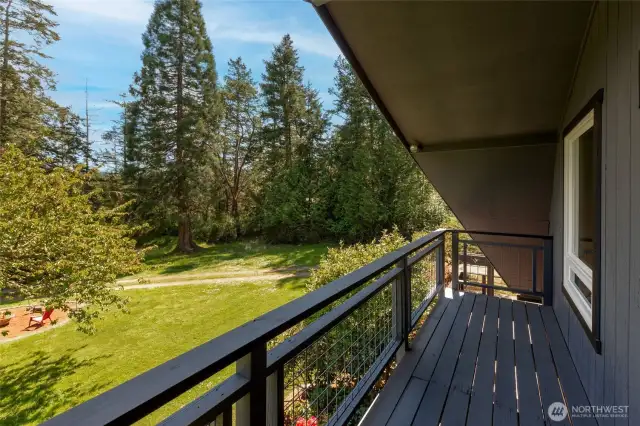 View from upper deck toward fire pit and front yard.