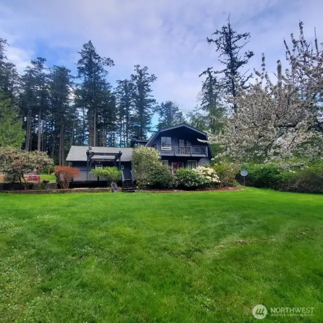 Front of house with landscaped gardens. If seeking privacy, make your appointment to view this property.