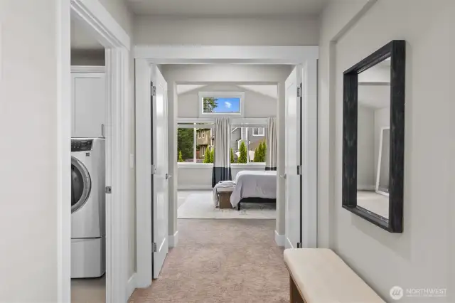 The upstairs laundry is conveniently located near all bedrooms, making everyday chores easier and more efficient.