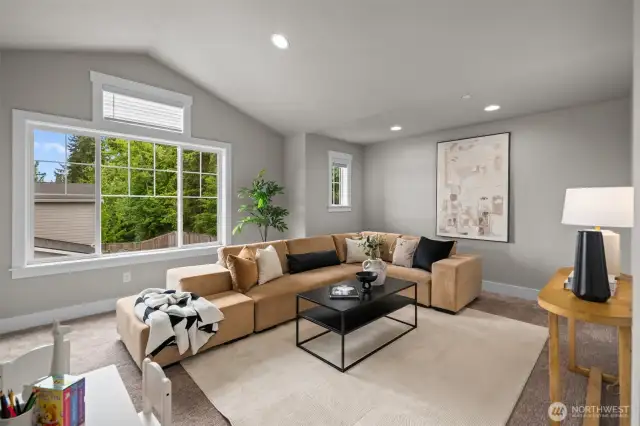 The extra-large bonus/media room boasts soaring vaulted ceilings and offers incredible flexibility—perfect for a home gym, media center, guest bedroom, or whatever your lifestyle demands.