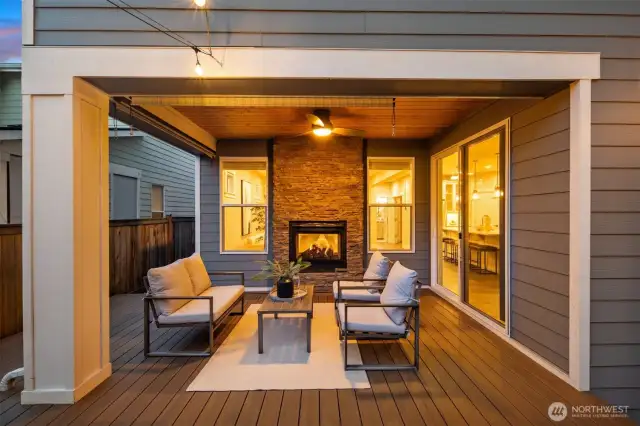Enjoy year-round comfort and unforgettable moments on the covered outdoor patio, featuring a see-through fireplace and incredible ambiance that sets the perfect scene for relaxing or entertaining in any season. THIS is where memories are made.
