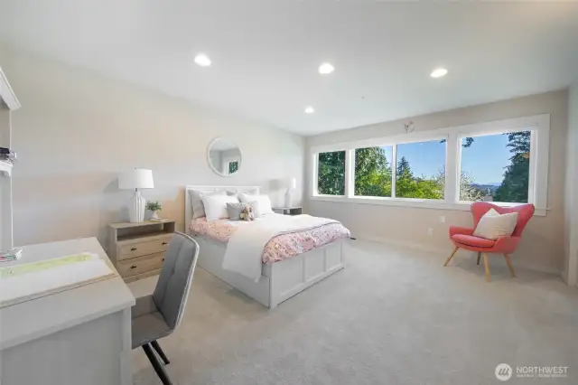 Third bedroom upstairs features wall to wall carpet and ample closet space.