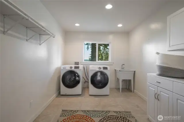 The spacious laundry room is conveniently located on the second floor.