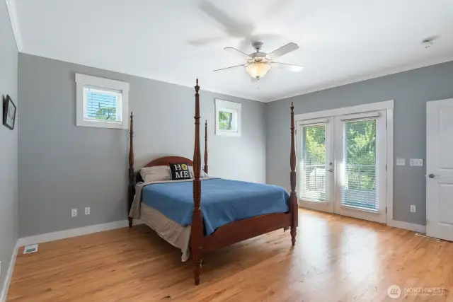 Primary with French Doors to your deck.