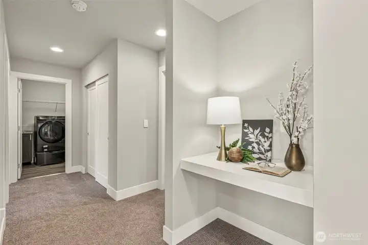 Upstairs hall with built in desk space