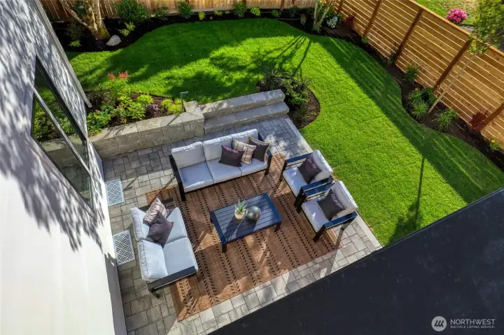 View of the picturesque backyard from the bonus room deck.