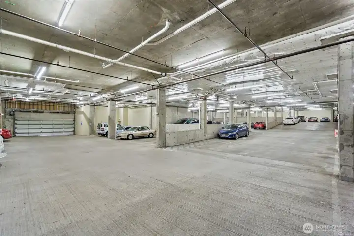 Secure parking garage with dedicated parking stall