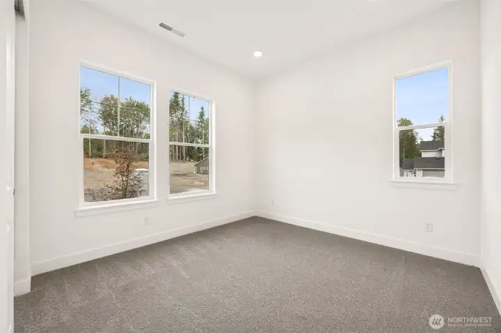 First two bedrooms joined by bathroom  Photos are of a different home. Standard finishes and features are similar and can be modified.