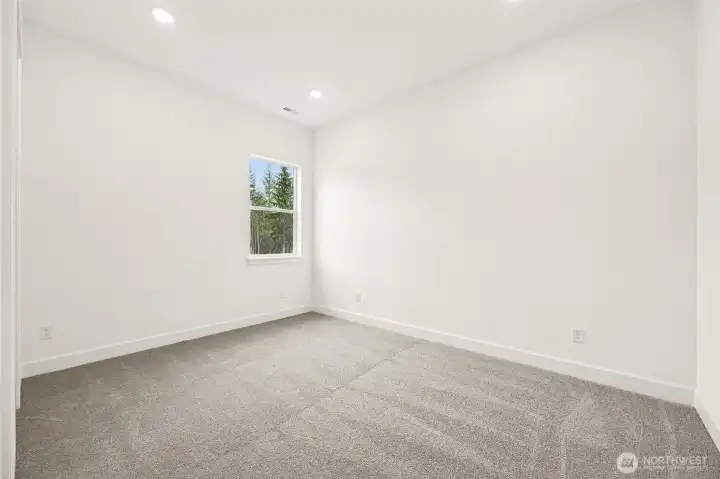 Photos are of a different home. Standard finishes and features are similar and can be modified.