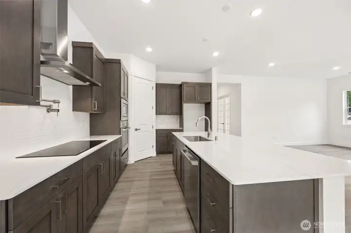 Photos are of a different home. Standard finishes and features are similar and can be modified.