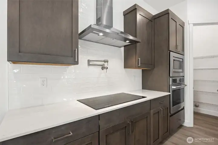 Photos are of a different home. Standard finishes and features are similar and can be modified.