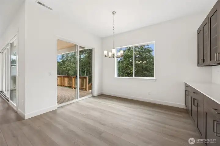 Dining nook. Photos are of a different home. Standard finishes and features are similar and can be modified.