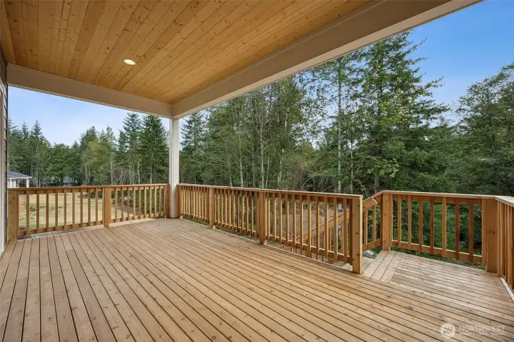 Covered deck. Photos are of a different home. Standard finishes and features are similar and can be modified.