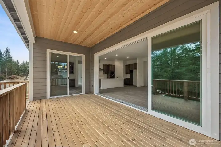 Covered deck. Photos are of a different home. Standard finishes and features are similar and can be modified.