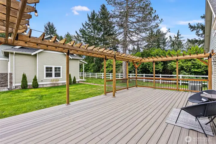 Deck Off Living and Dining Rooms – The spacious deck provides a peaceful place to relax, entertain, or enjoy the surrounding natural beauty of the property.