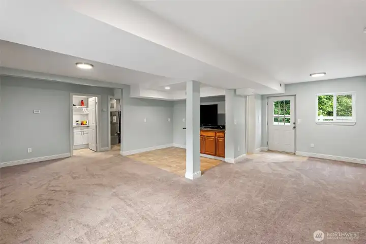 Basement Living Room – A spacious lower-level living area with potential space for a future kitchenette, creating flexible options for guests or multi-generational living.