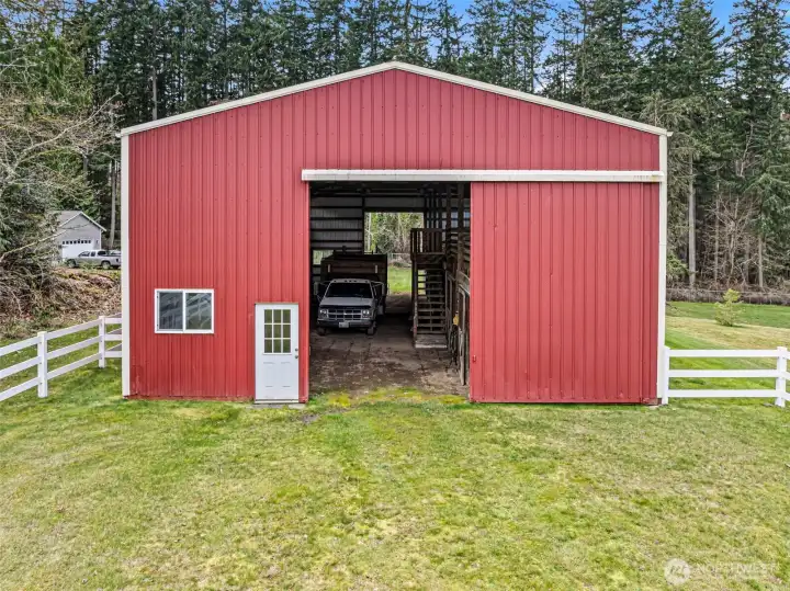 Barn Entry Close-Up –There is water and power to the barn to maximize functionality and potential. A closer look at the barn’s front entrance and equestrian facilities.