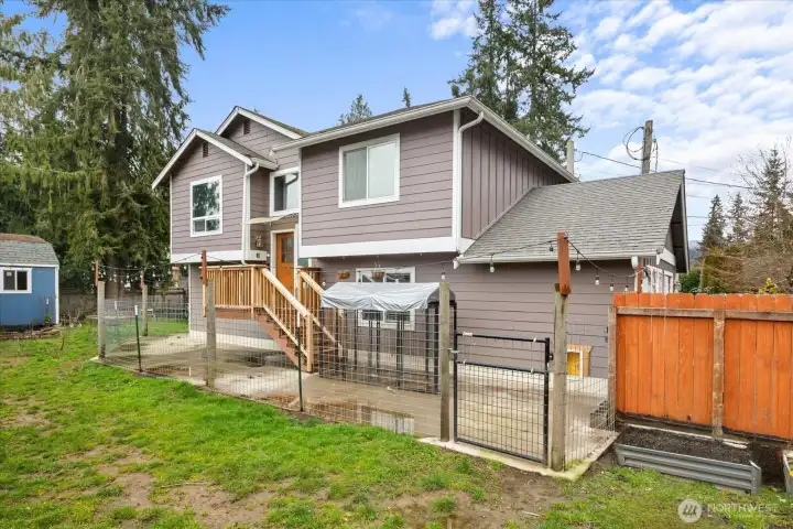 Welcome home! Original front door entrance showing enclosed dog run area