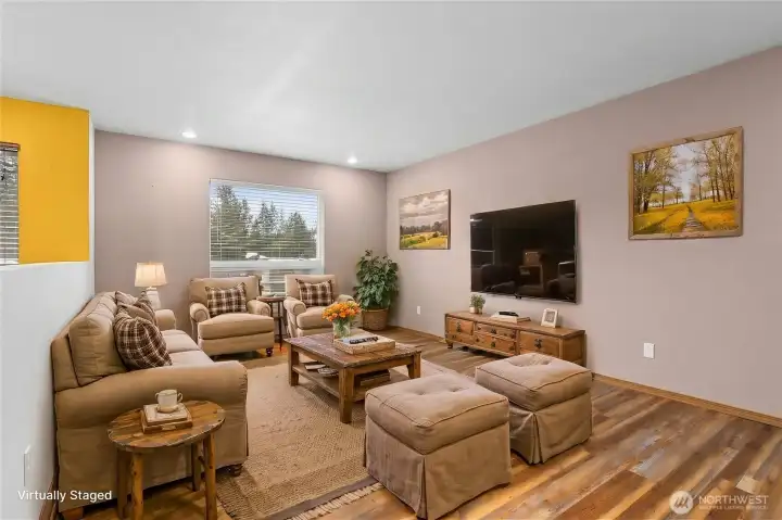 (Virtually staged) Main living room with natural light and mountain views