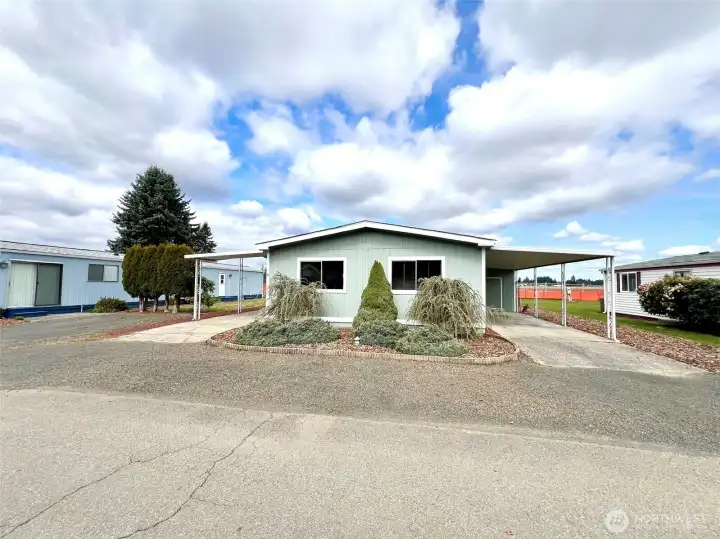 Front of home two car ports