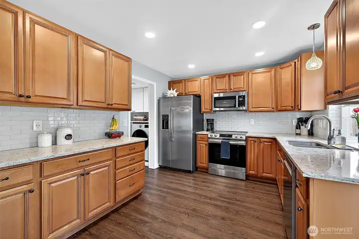 Kitchen That Leads To The Laundry Room and Garage.