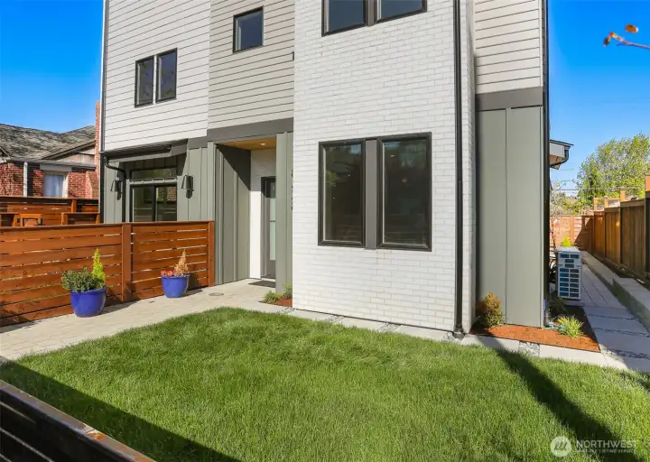 Nice front yard that is fully fenced.