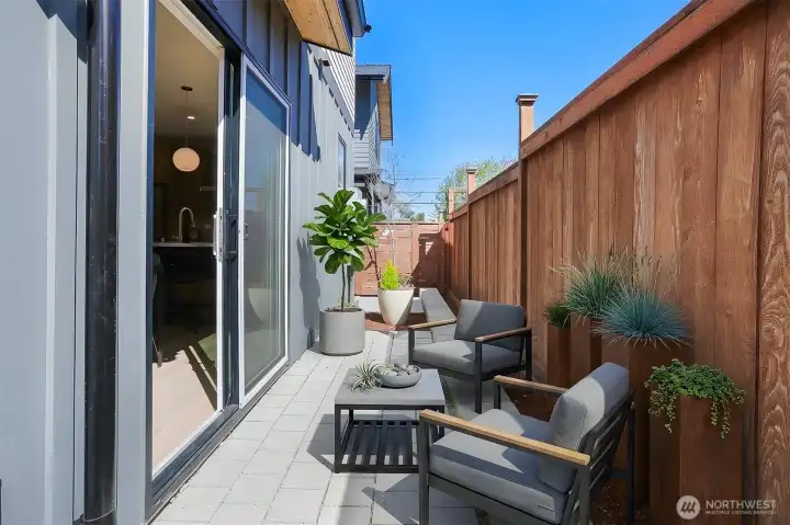 Virtually stage patio off the dining/living room  area